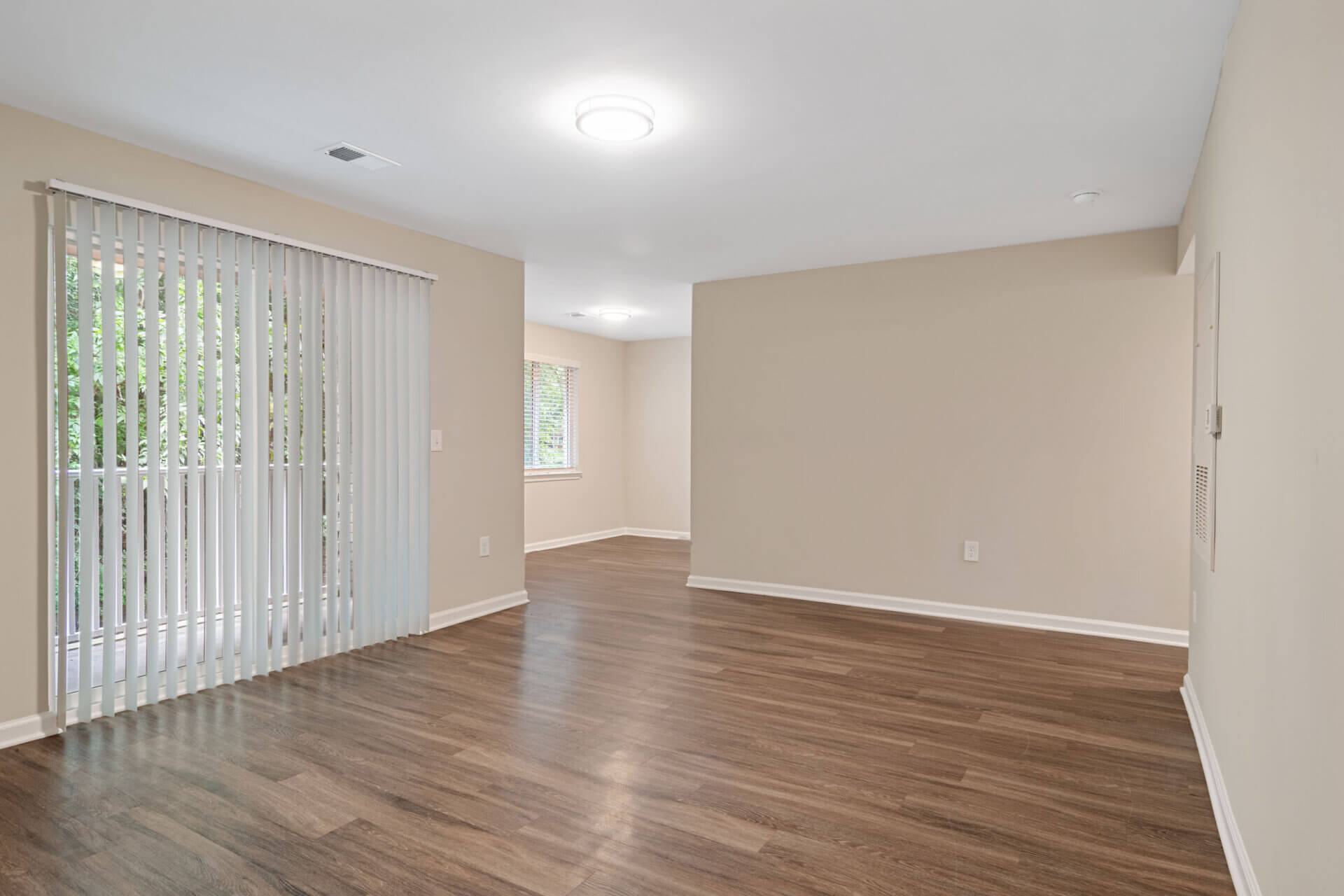 living room and dining area at vesta bouldercrest apartments in atlanta